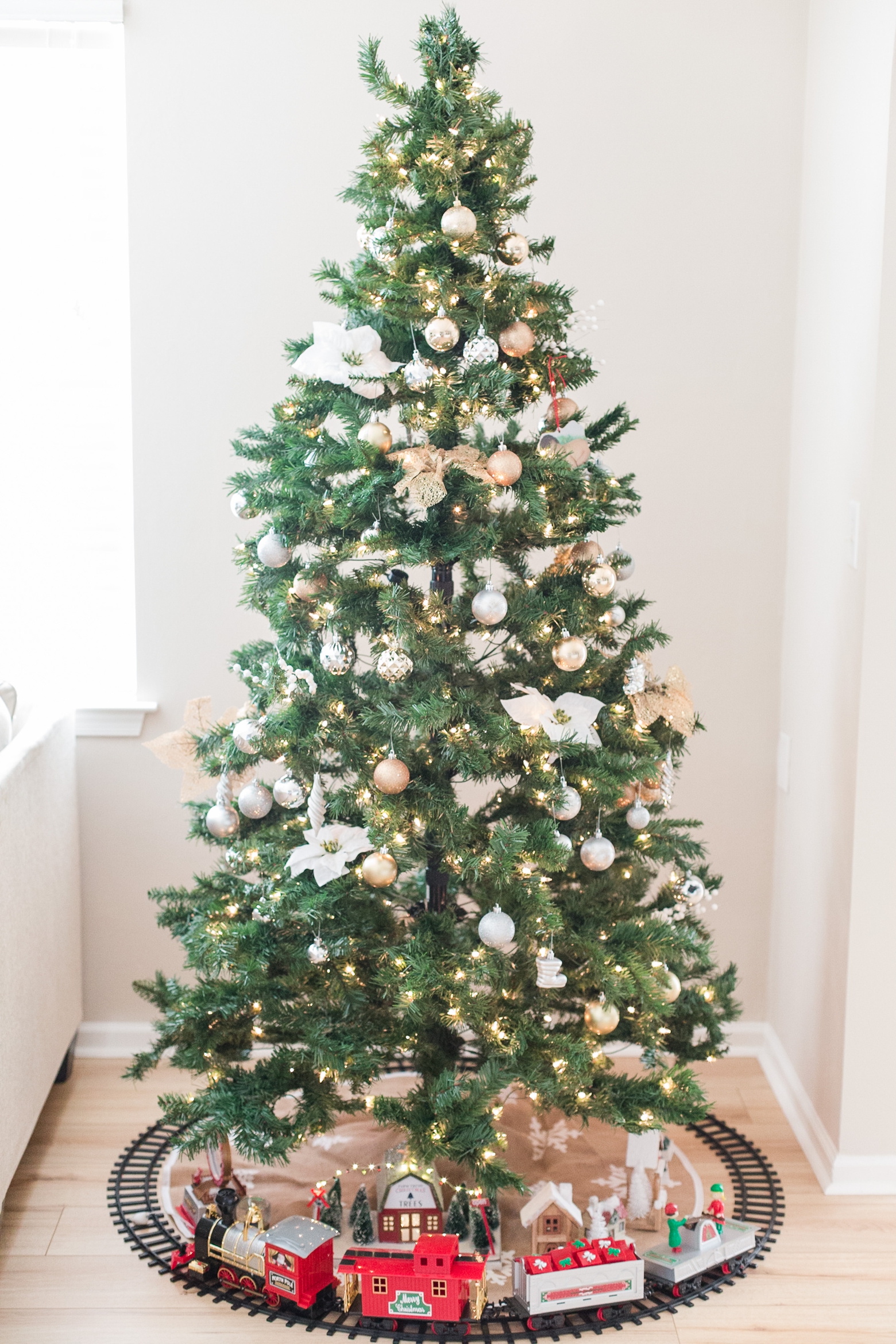 Bright and Airy Christmas Decor. Neutral colors with pops of green and gold!