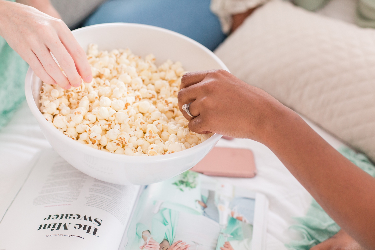 boutique owner branding photos with popcorn